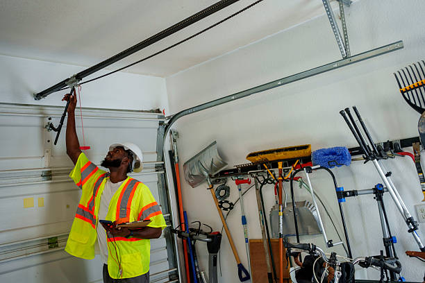 Professional Garage Door Panel Replacement technician working in Enterprise, WV